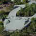 Image of V austrálskom parku majú hotel v tvare obrovského zeleného krokodíla